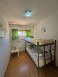 Postel nebo postele na pokoji v ubytování Dúplex, piscina y playa