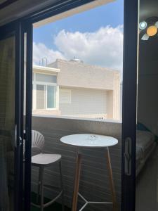 Balkón nebo terasa v ubytování Dou Dou Long Homestay