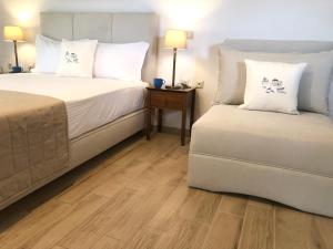 A bed or beds in a room at Aegean Blue Horizon