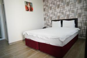 Postel nebo postele na pokoji v ubytování Inebolu Gardenya Hotel