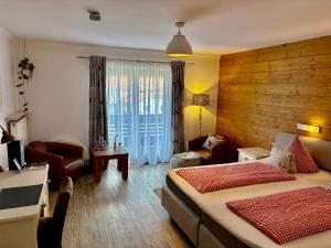 Postel nebo postele na pokoji v ubytování Alpinhotel INzeller
