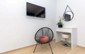 Televiisor ja/või meelelahutuskeskus majutusasutuses Villa Mara in Komarna by Villas Guide