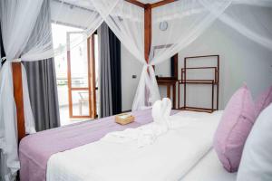 Postel nebo postele na pokoji v ubytování Hirigala Beach Resort