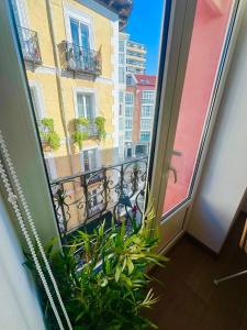 Μπαλκόνι ή βεράντα στο AtuaireHome Balcón a la Puebla 38 con Parking Incluido
