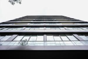 a tall building with lots of windows at Unit For Living in Beirut