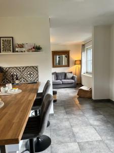 Posezení v ubytování Gîte La Clef des Champs + 37 fotografií