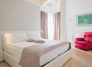 Posteľ alebo postele v izbe v ubytovaní Hotel Lux