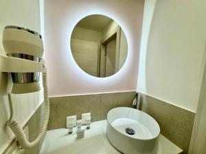 Koupelna v ubytování Hotel Astigiana & Appartamenti