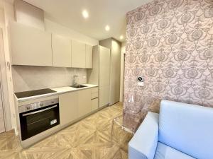 Kuchyň nebo kuchyňský kout v ubytování Hotel Astigiana & Appartamenti