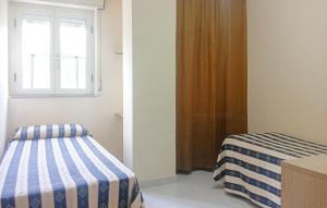 Uma cama ou camas num quarto em Nice Home In Ribera With Wifi