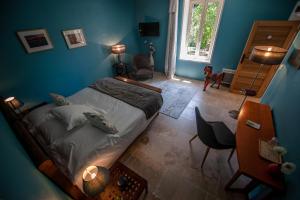 Postel nebo postele na pokoji v ubytování La Ressence Luberon