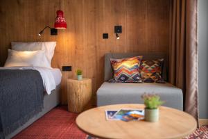 Postel nebo postele na pokoji v ubytování Hotel Nomad