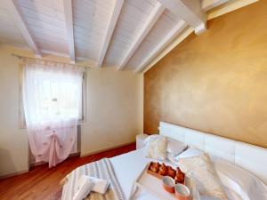 Postel nebo postele na pokoji v ubytování Maison Belvedere By Bookinggardalake + 22 fotografií