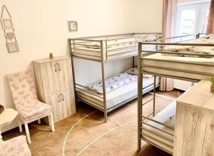 Cama ou camas em um quarto em New Hostel Berlin Mitte FREE SNACK hot tea and coffee