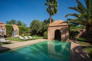 Πισίνα στο ή κοντά στο Villa luxe ADAMA avec gouvernante- Marrakech