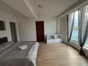 Ένα ή περισσότερα κρεβάτια σε δωμάτιο στο Hotel Palma