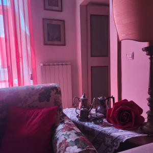 A bed or beds in a room at Suite Dimora Lucrezia