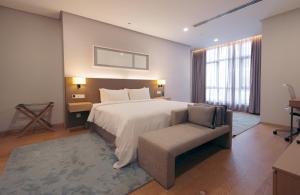 Ένα ή περισσότερα κρεβάτια σε δωμάτιο στο Sfera Residence Kuala Lumpur City Centre +69 φωτογραφίες