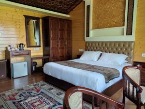 Postel nebo postele na pokoji v ubytování Almus Resorts