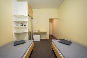 Voodi või voodid majutusasutuse Haapsalu Kutsehariduskeskuse hostel toas