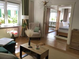 Posezení v ubytování Wohnung im Grünen