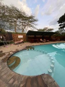 Bazén v ubytování Villa Elementaita 3 bedroom with Swimming pool Nakuru nebo v jeho okolí