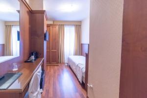 Posteľ alebo postele v izbe v ubytovaní Hotel Due Palme