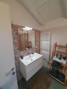 Postel nebo postele na pokoji v ubytování Cortile Fiorito B&B