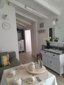 Kuchyň nebo kuchyňský kout v ubytování Cortile Fiorito B&B