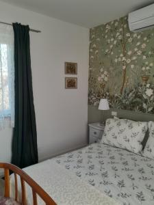 Postel nebo postele na pokoji v ubytování Cortile Fiorito B&B