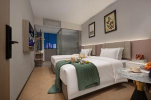Fotografie z fotogalerie ubytování Mercure Junfu Hotel International Financial City Keyun Road Subway Station Branch v Kantonu