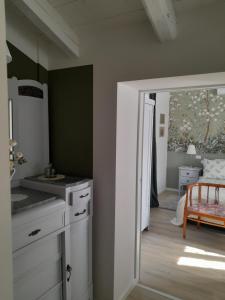 Kuchyň nebo kuchyňský kout v ubytování Cortile Fiorito B&B
