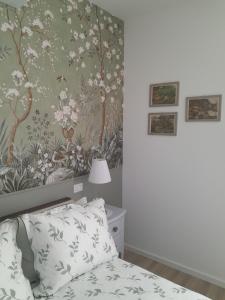 Postel nebo postele na pokoji v ubytování Cortile Fiorito B&B
