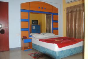 Llit o llits en una habitació de Hotel Sea Alif
