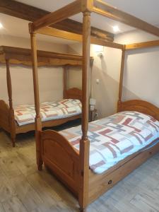 Postel nebo postele na pokoji v ubytování Gîte la bocagère