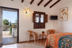 A bed or beds in a room at Boutique B&B Cortijo Valverde Álora