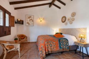 A seating area at Boutique B&B Cortijo Valverde Álora