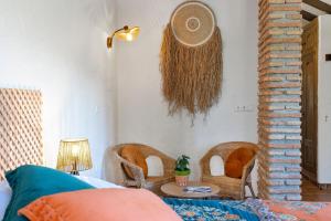 A seating area at Boutique B&B Cortijo Valverde Álora