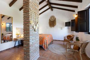 A seating area at Boutique B&B Cortijo Valverde Álora