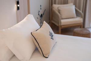 Кровать или кровати в номере PONTIANA Thalasso Hotel