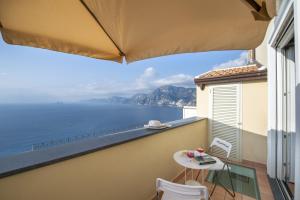 a balcony with a view of the ocean at Villa Cimino - for walking lovers! in Praiano