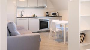 Kuchyň nebo kuchyňský kout v ubytování Loft in Villa Romana