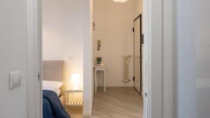 Postel nebo postele na pokoji v ubytování Loft in Villa Romana