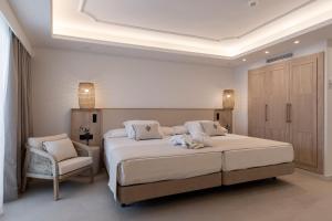 Кровать или кровати в номере PONTIANA Thalasso Hotel