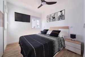 Postel nebo postele na pokoji v ubytování Manilva Beach Apartment + 22 fotografií