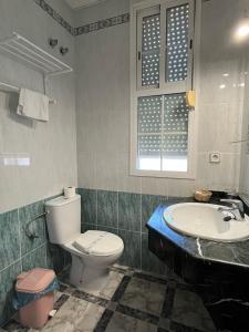 Koupelna v ubytování Hostal Quinto Pino