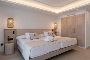 Кровать или кровати в номере PONTIANA Thalasso Hotel