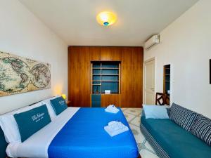Posteľ alebo postele v izbe v ubytovaní Villa Falconieri Sorrento Suite