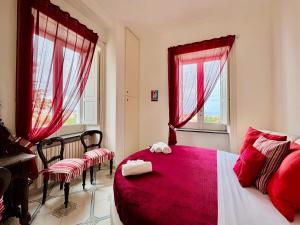 Posteľ alebo postele v izbe v ubytovaní Villa Falconieri Sorrento Suite
