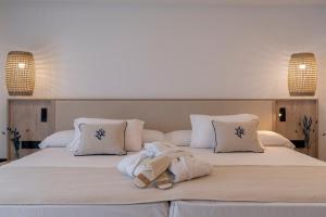 Кровать или кровати в номере PONTIANA Thalasso Hotel